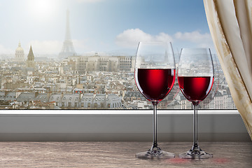 Image showing View of Paris and Eiffel tower from window with two glasses of w