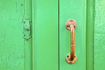 Image showing spain   brass knocker  abstract door wood in the green 