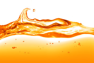 Image showing orange water splash isolated on white