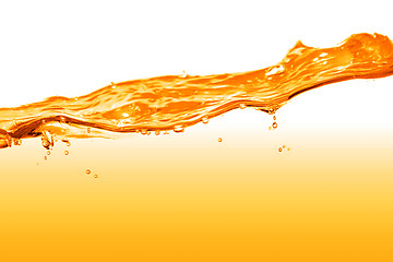 Image showing orange water splash isolated on white
