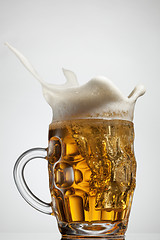 Image showing Beer splash in glass isolated on white