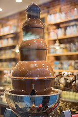 Image showing chocolate fountain in belgium shop