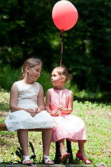 Image showing Two girls in park