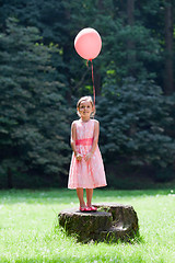 Image showing Little girl with balloon