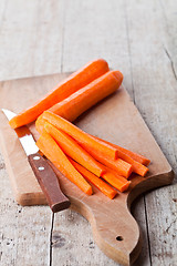 Image showing fresh carrot and knife 