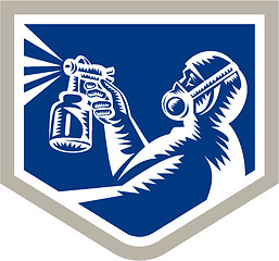 Image showing Spray Painter Spraying Woodcut Crest Retro