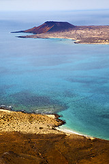 Image showing miramar del rio harbor rock stone sky cloud   in lanzarote spain