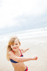 Image showing Young girl having fun at beach