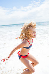 Image showing Young girl having fun at beach