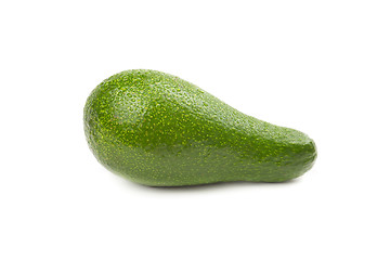 Image showing Green avocado with water drops