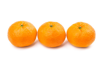 Image showing Close-up of three sweet mandarins