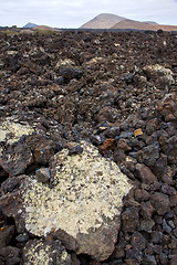 Image showing volcanic stone in los volcanes   rock  sky  hill and summer 