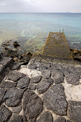 Image showing pier rusty chain  water  boat yacht  lanzarote spain