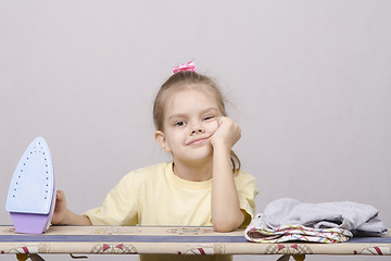 Image showing the child's exhausted ironed linen