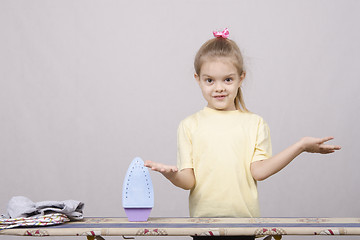 Image showing the girl quickly stroked her clothes