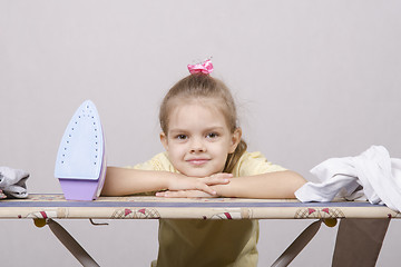 Image showing child rests on the Ironing