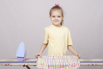 Image showing the child turns underwear when Ironing