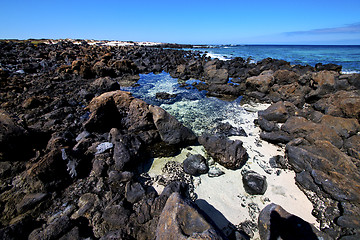 Image showing sky light  beach water  in lanzarote  isle foam rock spain lands