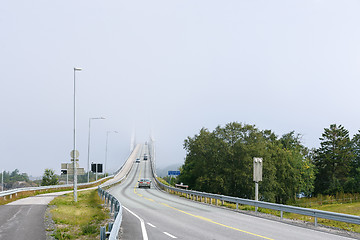 Image showing Bridge disappearing in fog