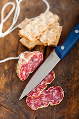 Image showing italian salame pressato pressed slicing