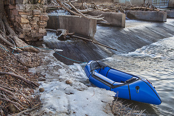 Image showing packraft and river dam