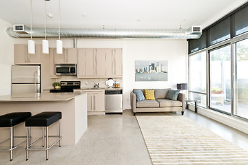 Image showing Modern condo kitchen and living room