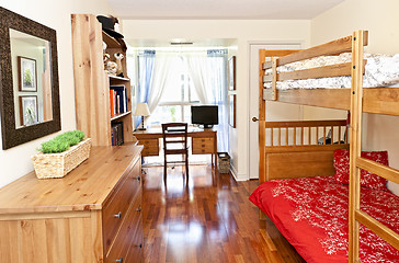 Image showing Bedroom interior with hardwood floor