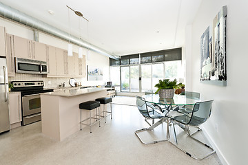 Image showing Modern condo kitchen dining and living room