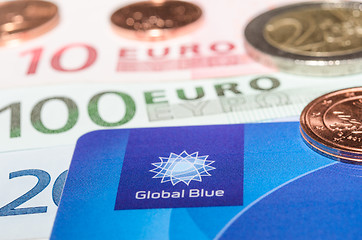 Image showing Closeup Tax Free plastic card from company Global Blue banknotes