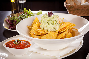 Image showing Crisp corn nachos with guacamole sauce