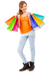 Image showing Happy attractive young shopaholic