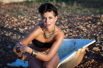 Image showing Glamorous woman in animal print shorts