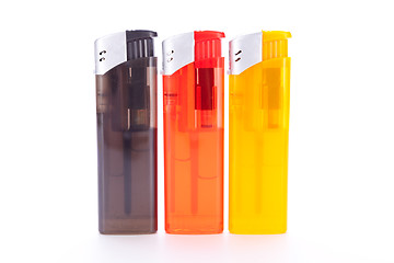 Image showing Vividly coloured plastic lighters