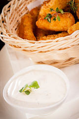 Image showing Crumbed chicken nuggets in a basket