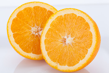 Image showing Fresh orange halved to show the pulp