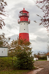 Image showing landscape baltic sea dunes lighthouse in red and white 