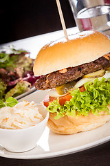 Image showing Cheeseburger with cole slaw 