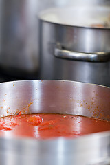 Image showing Cooking in a commercial kitchen