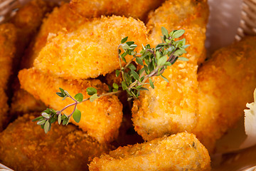 Image showing Crumbed chicken nuggets in a basket