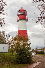 Image showing landscape baltic sea dunes lighthouse in red and white 