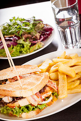 Image showing Club sandwich with potato French fries