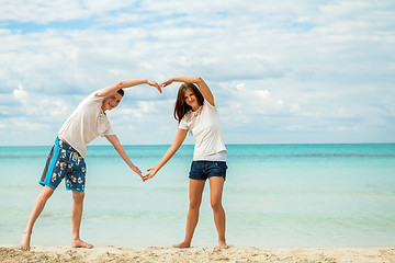 Image showing smiling young couple having fun in summer holiday