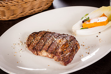 Image showing Grilled beef steak with seasoning