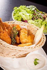 Image showing Crisp crunchy golden chicken legs and wings