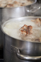 Image showing Cooking in a commercial kitchen