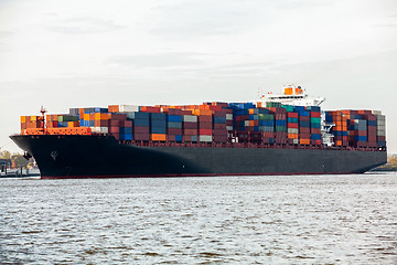 Image showing Fully laden container ship in port