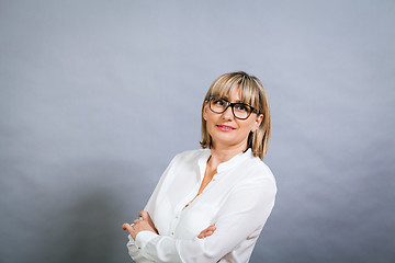 Image showing Scholarly attractive woman in glasses