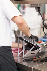 Image showing Chef slicing boiled beetroot