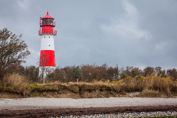 Image showing landscape baltic sea dunes lighthouse in red and white 