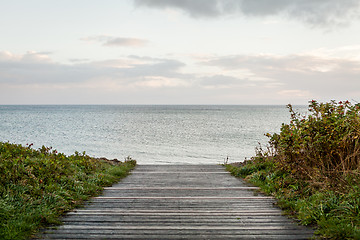 Image showing Bridge or pier across an expanse of sea